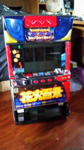2 working slot machines ...large bag of tokens included