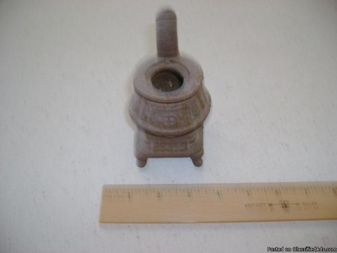 Miniature cast iron burning stove - Price: $20