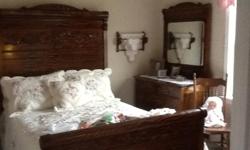100+ year old oak bedroom set includes:&nbsp; full size bed and like new mattress, dresser, wash stand & two night tables.&nbsp; Womelsdorf, PA area.