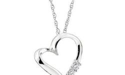 A romantic gift that will be cherished for years to come. This elegant pandant is crafted in 10K White Gold and features 3 diamonds totaling 0.10 Carat. An 18" chain is included.
Click Here! http://snurl.com/24119db