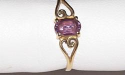 10KP KT YELLOW GOLD AMETHYST RING
Pre-Owned
Size 5.25
The inside of the ring is stamped 10KP which means the following and is more valuable than ?KT?
Pure gold is not practical for most jewelry applications because it is too soft so other metals are added