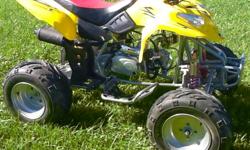 This is a very gently used 125 cc ATV - perfect for the novice rider or bigger kids who need something bigger than the youth size. This is a 4-stroke, gas powered, air-cooled semi-automatic. For questions, call Kevin or Carol or visit our showroom for a