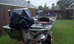 Perfect duck hunting boat for two hunters and a dog. Complete with pop up blind, just add fast grass to already installed brackets. Elec start Motor is in great shape and has low hours. Used only for duck season, but maintained year round. Trailer and