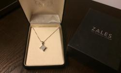 Beautiful white gold diamond pendant necklace from Zales. Originally paid over $400. Jeweler estimates .5c&nbsp;diamonds with approximately 18.5" chain. Excellent condition!!