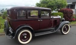Beautifully restored, original 1930 Chevy sedan car with low mileage. Mechanically, the car is in excellent condition throughout. The interior looks like new, since it was completely reupholstered with mohair finish. Has new whitewall tires and new