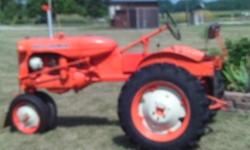 1942 Allis Chalmer C Tractor. This Tractor has New tires and tubes, New paint and decals, New seat and steering wheel. The electrical system has been changed to 12 volt.&nbsp; It has a Fairbanks Mag. The seat is not in the picture, I have the seat in the