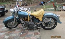 Classic Harley 1952, newly rebuilt, looks great, this is a show quality motorcycle, Teal blue with fine metal flake pearled in paint job, 3 inch BDL belt drive, Fat boy wheels, S&S carb. super E, Custom elk skin leather dash and seat, Front and back disc