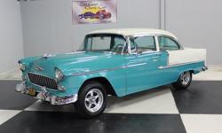 Stk#053 1955 Chevrolet Belair This beautiful Turquoise and Ivory Belair has been rotisserie done. It is slick, straight and beautiful. A one piece floor and trunk pan was installed. All of the chrome has been replaced and the stainless was buffed. All new