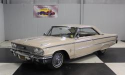 Stk#141 1963 Ford Galaxie 500 Fastback
Original 39,395 mile car
Painted Sandstone paint with front & rear chrome bumpers with round rubber bumper guards, grill all are nice. The body side moldings and emblems are nice. The window trim, door handles, dual