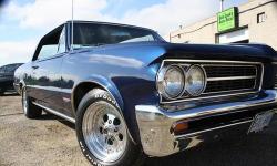 Mileage:&nbsp;&nbsp; &nbsp;8,000 miles
Interior Color:&nbsp;&nbsp; &nbsp;Black
Exterior Color:&nbsp;&nbsp; &nbsp;Blue
GTO 1964 "One of a Kind", Body off Restoration, PHS Document, 389 Tri-Power, bucket seats with console, Factory Air, Numerous upgrades, 2