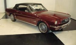 Stk#140 1965 Ford Mustang Convertible
#'s Matching car
Exterior: Burgundy paint, Rocker panel moldings, front & rear bumpers like new, tail lights are nice. The luggage rack, door handles, dual outside mirrors, emblems, grill are all really nice. Black