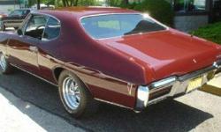PHS Documented 1968 GTO Hard Top Rebuilt 400 Four Speed.......Custom Chrome Cragar SS Wheels.......New Burgundy paint original (Matching Vin Tag Colors).......Check it out you will be impressed with this SOLID CLASSIC and a Great Investment!!!!! &nbsp;