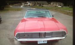 1969 cougar XR7 Red 390 low miles all orignal. needs new top nice lether int. automatic. might even deliver.