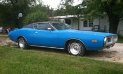Original Richard Petty Blue 1972 Dodge Charger. Sporting a completely rebuilt 440 with only a few hundred miles on it and a 727 transmission with console shift and bucket seats. Super clean interior and nice landau top. Slight exterior rust. Great