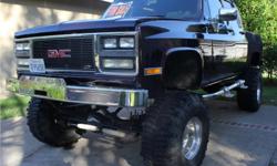 Registered until December 2011, Smog Exempt, and STREET LEGAL!
5 foot bed
Full inteior roll cage
Custom graphic paint job with tribal ghost flames
3/4 ton axles both geared 4:56 air locker up front
crossover stearing
38 1/2" super Swamper boggers on 12"