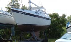 1973 Tanzer 28
This is a boat with a large cabin area for a 28 footer due to its flush deck. It would make a good liveaboard, and is set up for simple cruising. It is pretty close to being ready to sail down the ICW to the Keys or Bahamas. This is a well