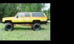 THIS IS A CUSTOMIZED 1984 CHEVROLET SUBURBAN WITH ABOUT 35,000 ON THE ENGINE. K30 1 TON. I HAVE OWNED THIS SUBURBAN FOR ABOUT 15 YEARS. AND IT'S A REAL HEAD TURNER.
EXTERIOR: THE EXTERIOR IS TRIMMED WITH 12" CUSTOM FABRICATED DIAMOND PLATE AS WELL AS THE