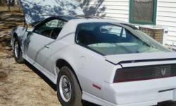 84 Trans am,, rebuilt motor ,, with a used 700 tranmission ready to be installed,, alot of new parts,, new clutch fan .. new tires .. new brakes,, used ac compressor,,, It needs a paint job,, but its all ready primed and ready to be painted&nbsp;the color