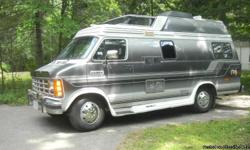 19.5ft. 1-ton Conversion Van with slide-out awnings, screened windows, Dodge 5.9L engine, one A/C and heater and 4.KW generator, stove, microwave, coffee maker, refrigerator, sink, TV, toilet, and CB radio. Two passenger vehicle sleeps two in bed. Folding