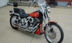 &nbsp;
&nbsp;It has been well loved and dealer maintained. It has many options and chrome added including the rare air scoop(a Harley painted to match option.) The bike runs and
rides great, and gets looks from everyone with it's red, gold and black