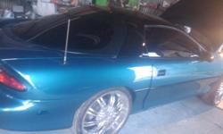 1995 camaro z28 with fresh candy paint and 22 inch rims. 5.7 tuneport engine brand new transmission. shiftkit. gears in rear end.. leather interior. k&n air intake. ice cold ac. new hypertech high performance thermostat. flow masters. major sound system.