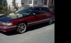 Two tone balck and red custom wheels all leather interior....104,700 miles Selling the vechile because i need cash....It has a brand new battery and alternated fuel pump brakes spark plugs also touch screen head unit.....Really hate to see it go...Only