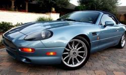 Send me an email at: hortensehddeculus@ukpainters.com . This 1997 Aston Martin DB7 Volante was custom ordered as a factory ?one off? finished in Rolls Royce Aegean Blue, with custom leather interior, in white with blue accents. While I can't say if any of