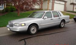 97 Lincoln Town Car, one owner, good tires and brakes, silver in color, gray leather seats, 122k miles and still rides like at dream. Call Todd @ 303-917-8487