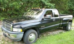 1998 Dodge Ram 3500 SLT Laramie extended cab two wheel drive with the 5.9L Cummins diesel. I have personaly been driving this truck for over 6 years. It is a great truck and the only reason for selling is to upgrade to a crew cab. The truck has leather
