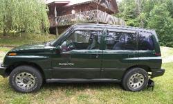 Low milegage 1998 Suzuki Sidekick JX. 4 door, 4 cyl. AT, PS, PB, airbags, A/C works, 4x4 works, tinted glass. Some of the clear coat is coming off the roof but vehicle is in good condition. 64K actual miles.