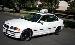 Make: BMW
Model: 328i
Year: 1999
Miles: 145,000
Color, ext: White
Color, int: Tan
Condition: Good
Engine size/type: 2.8-liter V-6
Transmission: Automatic.
Driveline config: Front engine, rear drive
0-60 mph, sec: 6.9
EPA mpg, city/hwy: 20/29
Interior: