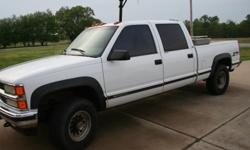 1999 White Chevy Z71 4 door 4 wheel drive truck. 164,159 Miles, Tool box, Reese hitch.