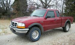 1999 Ford Ranger XLT 4x4. This truck is an Extended cab with the 4.0 L V-6, automatic transmission, power locks, power windows, tilt wheel, cruise control, air conditioning, electric shift four wheel drive. We installed new 31-10.50-15 tires and replace