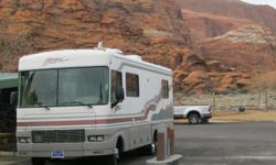 30 ft. Class A Motorhome with 71k miles. &nbsp;Very clean inside. &nbsp;Ford Triton V-10 engine. &nbsp;Sleeps 6 with a Queen bed in bedroom, couch queen pull out bed, and a dinette that becomes a full bed. &nbsp;Two updated flat screen LED TV's, new