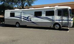 This 2000 Holiday Rambler Endeavor is powered by a 330hp Cat diesel engine with an automatic transmission on a freightliner chassis. The RV features a large patio awning, entry door awning, dual air conditioning units, two slide outs, hydraulic leveling,