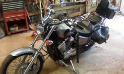 2000 Honda shadow VLX 600 Very nice bike has 14000 miles on it. Always put in side has new tire on the front and has side bags and a back bag. Has green ground lights from front to back asking 2500$ call Brandon at 770-654-nine six four five thanks