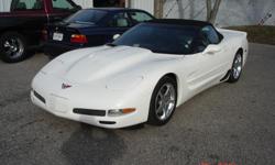 Garage kept 2001 Corvette Convertable, white the black soft top.&nbsp;The car has aftermarket Borla exhaust, and a carbon fiber cowl induction hood. Very clean 23,000 miles, for more info call --.