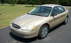 2001 Ford Taurus LX. This car came from the Dept. of Natural Recources and has been well cared for while they drove the 137,000 miles that are on it now. The inside looks like new. It has power locks, power windows, air conditioning that works well,