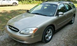 2001 Ford Taurus SE wagon. This car comes from the Dept. of Agriculture and is so clean that it looks new inside. The car has 124,000 miles and runs as good, as it looks. It has power windows, power locks, tilt wheel, cruise controll, automatic