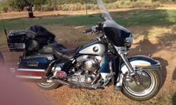 Blue and Silver 2001 HD Screaming Eagle and trailer. Runs great. In great condition. 39364 miles.