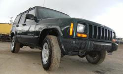 2001 Jeep Cherokee Sport XJ. 4x4, 4.0 HO six cylinder engine, automatic transmission. Forest green with charcoal interior. Paint has blistering and scratching, interior is in very good shape. 136,000 miles. Tires in excellent condition, has appx 90%