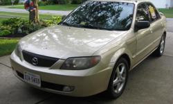 2001 Mazda Protege, ES 2.0, 4 door, stick shift - 5 speed, 144300 miles,
Fair condition - some dents and dings
Runs great. Sunroof, spoiler, alloy wheels, window tint, tilt wheel, cruise,
auto-windows & locks, A/C needs re-charge, needs a spare tire.