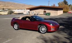 Spyder Eclipse GT convertible, red body with new tan soft top, tan leather seats. Has mulit-disk player.&nbsp; Power driver seat .&nbsp; New clutch in 2013, starter motor, complete history on the car,76000 miles on the car.&nbsp; One of a kind!&nbsp; Call