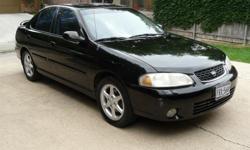 2001 Nissan Sentra SE, 2.0 liter, automatic, with 100k mi. One owner and is in very good mechanical condition with new brakes and tires. Regular maintenance done. Some cosmetic wear and tear in both exterior and interior. Excellent and reliable