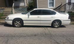 All white Impala. I'm not sure whats wrong with it but it's&nbsp;for sell and can be use for&nbsp;parts.&nbsp;