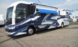 Outside: The outside is in good shape. The camper has full body paint, good glass, 2 slide outs, slide out awnings, window awnings, electric porch awning, door awning, full basement storage with sliding storage trays, back up camera, tow package, 330