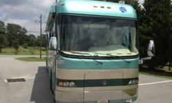 2002 Holiday Rambler Navigator with 2 slides. Cummins 500 horsepower diesel with a 10 on an generator. 58,000 miles and the generator has 973 hours all have been maintained per owners manual with synthetic oil used in both. Corian Counter Tops,Dinette