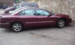 2002 Pontiac Bonneville, burgundy 4dr sdn. RUNS GOOD. 117,000 highway miles, updated inspection stickers, 2nd owner in fair condition!