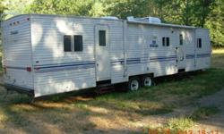 2002 Prowler Travel Trailer, 39 ft., 2 slide-outs, 2 queen beds, bath with shower, plus outside shower, A/C, stereo with CD player, antennae.&nbsp;&nbsp;Clean and good condition.&nbsp; Asking $13,500.&nbsp;