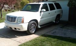 2003 Cadillac Escalade. Loaded with almost every available option. Only 68K Miles! Pearl white, tan leather, moonroof, ice cold ac, power windows, power locks, bose sound, 6 disk in dash cd, sirius/xm, onstar, and much more! Looks, runs, and drive 100%!